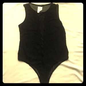 NWT black bodysuit. Size Large.
